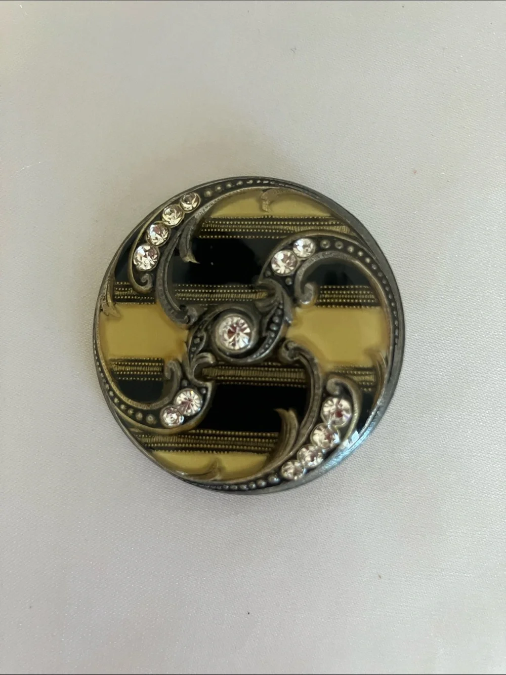 Catherine Popesco France Black and Cream Enamel Crystal Swirl Brooch